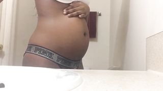 Ebony Girl Fills her Belly with Air