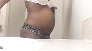 Ebony Girl Fills her Belly with Air