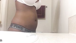 Ebony Girl Fills her Belly with Air