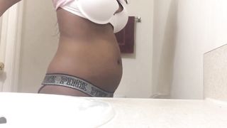 Ebony Girl Fills her Belly with Air