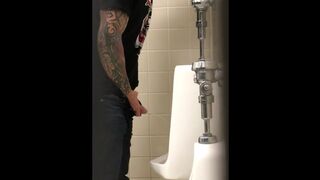 Tattooed Pisser with Nice Cock Notices his Voyeur Spying on Him.