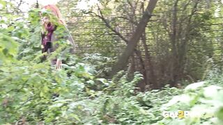 Redheaded Babe Pisses Long And Hard In Trees