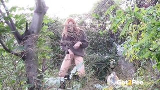 Redheaded Babe Pisses Long And Hard In Trees