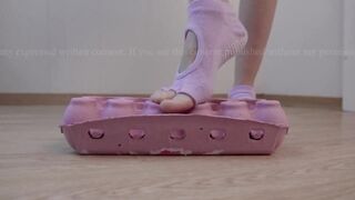 Crushing Egg Carton Wearing Yoga Socks