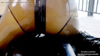 Latex lesbian breathplay with vacuum bag Part 2