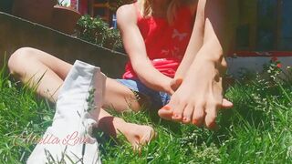 Girl Wearing her White Ninja Shoes in the Garden