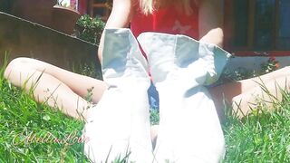 Girl Wearing her White Ninja Shoes in the Garden