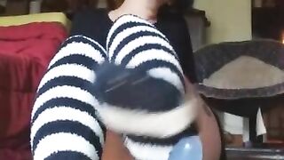 Fuzzy socks caress and stroke dildo