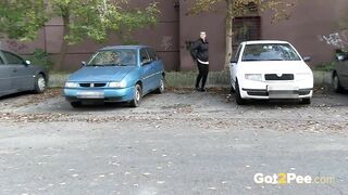 Squatting Between Parked Cars To Piss In Public