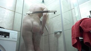 Slim MILF with a big booty in the shower.