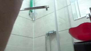 Slim MILF with a big booty in the shower.