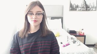 Cute nerdy Colombian girl pulls down her jeans and panties