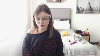 Cute nerdy Colombian girl pulls down her jeans and panties