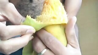 Eating Mango in New york Mount Men Rock Mercury