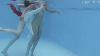 Anastasia Ocean and Marfa are naked underwater