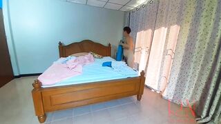 Nudist housekeeper Regina Noir makes the bedding in the bedroom. Naked maid. Naked housewife. 2