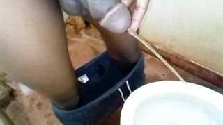 Man Pissing With An Erect Penis