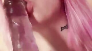 Hot tattooed girl sucking a dildo and fucks herself