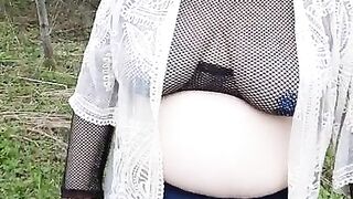 BBW bouncing fat tits in the woods