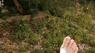 Feet solo in the garden while masturbating