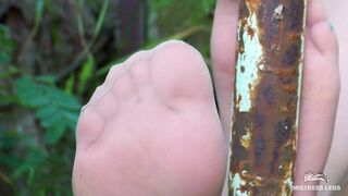 Sexy bare feet and nylon soles outdoor closeups