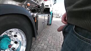 Pissing against a truck tire