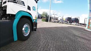 Pissing against a truck tire