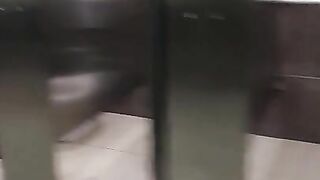 Pissing in the bathroom of the mall