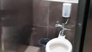 Pissing in the bathroom of the mall