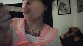 Big Tittied Goth Whore Deep Throating her Toy