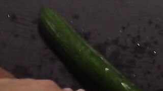 Fucking my tiny pussy with a huge cucumber and squirting everywhere while wearing ripped pantyhose