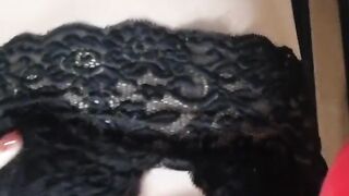 Gentle homemade striptease in black. Close-up