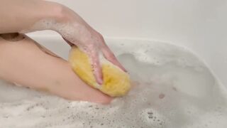 Washing feet in bubble bath