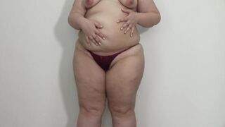 BBW shakes stuffed belly and big ass in panties. Fetish.