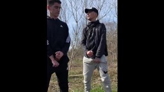 TWO GUYS JERK OFF OUTDOORS