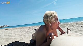 Blowjob on a public beach