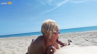 Blowjob on a public beach