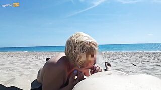 Blowjob on a public beach