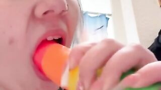 Sucking huge rainbow dick