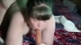 Slut gets spit roast by two black dicks