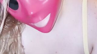 She sucks my cock through her pink purge mask