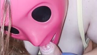 She sucks my cock through her pink purge mask