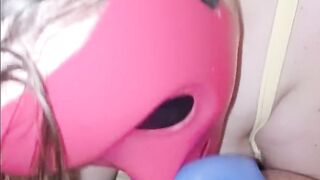 She sucks my cock through her pink purge mask