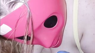 She sucks my cock through her pink purge mask