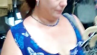 BBW milf flashing tits in a clothing store