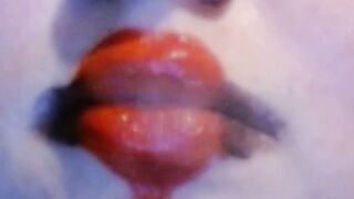 Red Heart Lipstick And Smoking Upclose