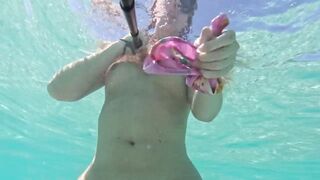 girl takes off her panties pussy underwater and swims naked