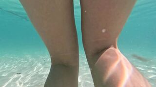 girl takes off her panties pussy underwater and swims naked