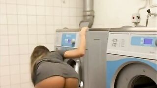 Sneaky stepsis playing with vibrator in public laundry room